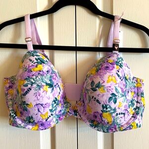 New Victoria’s Secret lined demi bra with floral pattern. Size 38 DD.